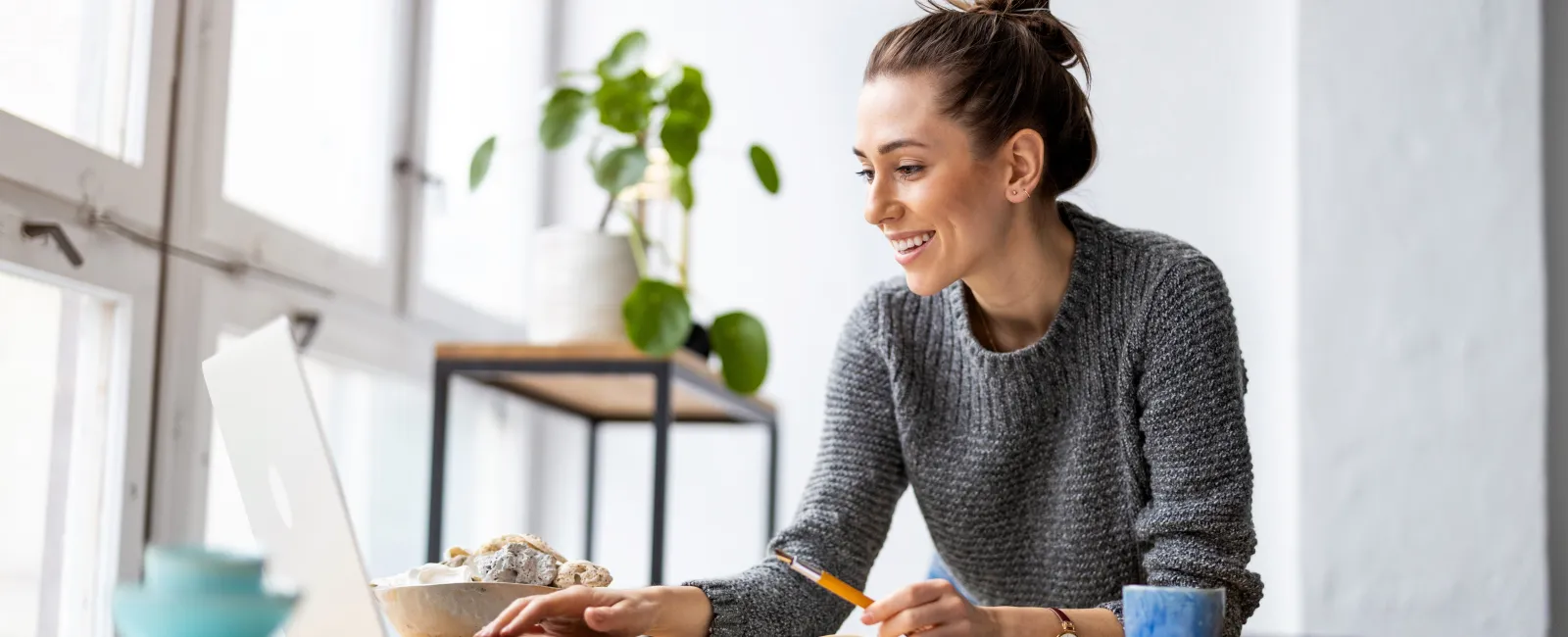 a woman working on her laptop