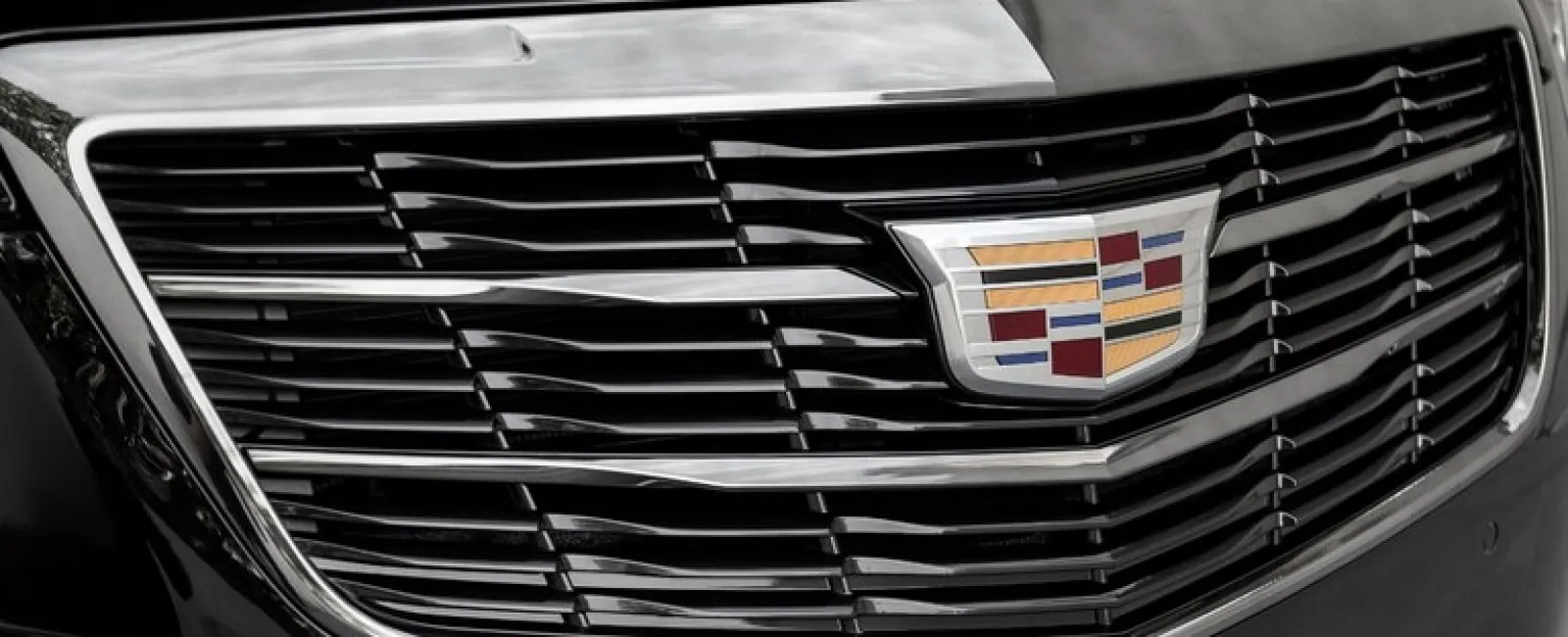 a close up of a car's grill