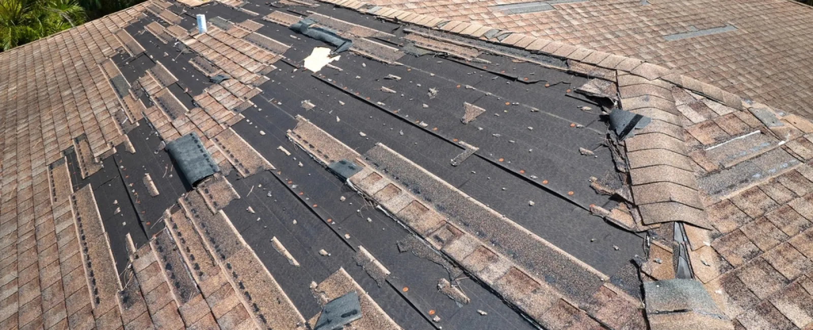 having a damaged roof has homeowners asking how to get insurance to pay for roof replacement