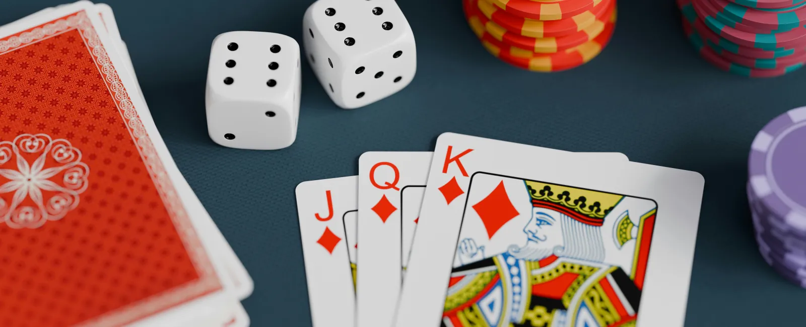Poker cards with diamond face cards, dice, and colorful poker chips on a dark table background - casino cyber security