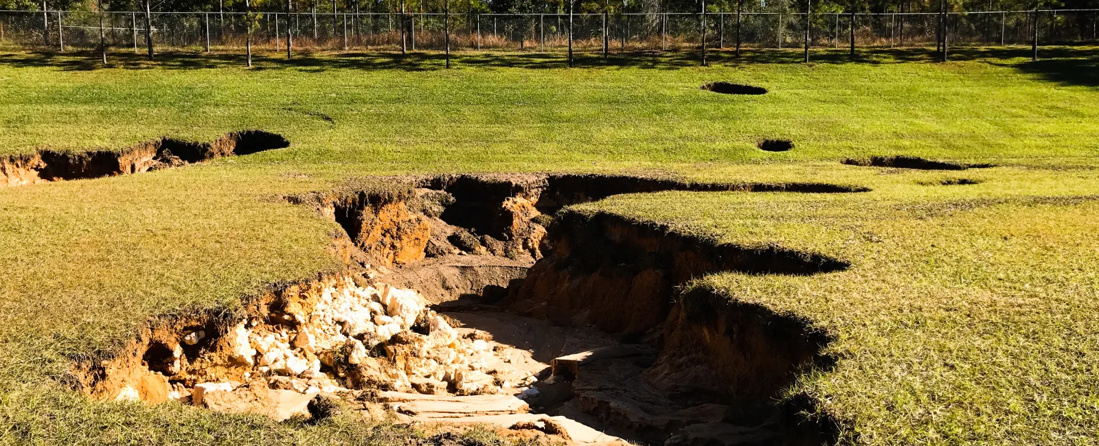 a pile of dirt in a field