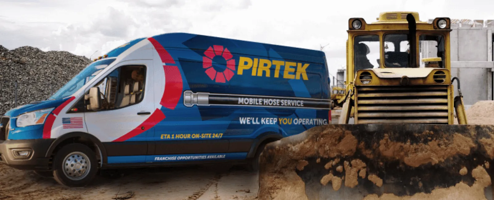 Pirtek mobile hose service van parked next to a bulldozer in a sandy construction site under cloudy sky.
