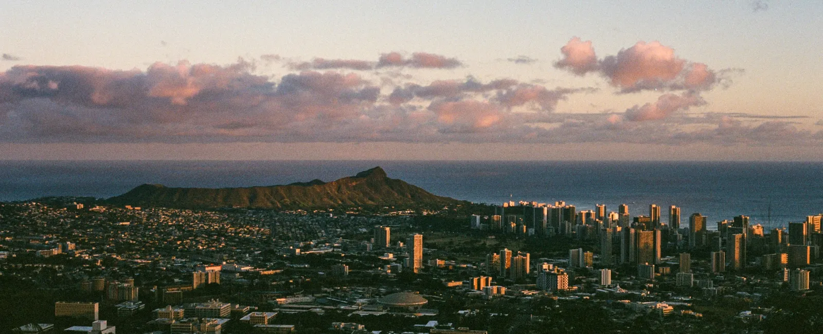 a city with a hill in the background