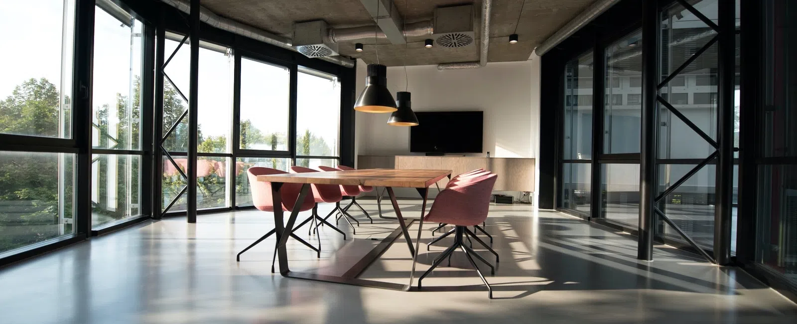 a room with a table and chairs