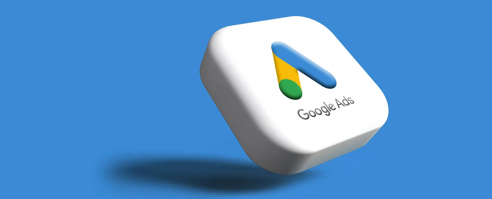 3D Google Ads logo block floating with shadow on blue background with white block and colorful logo