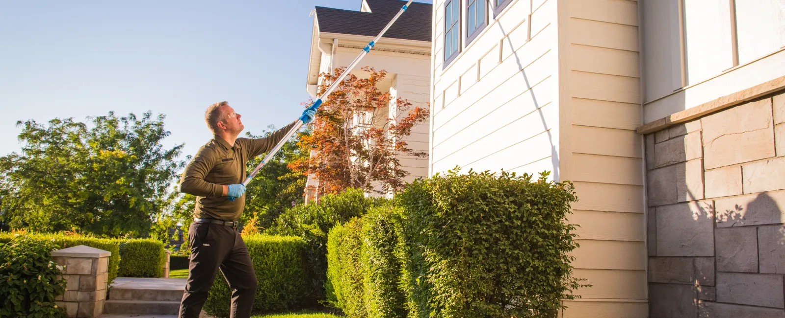 a pest tech eave sweeping