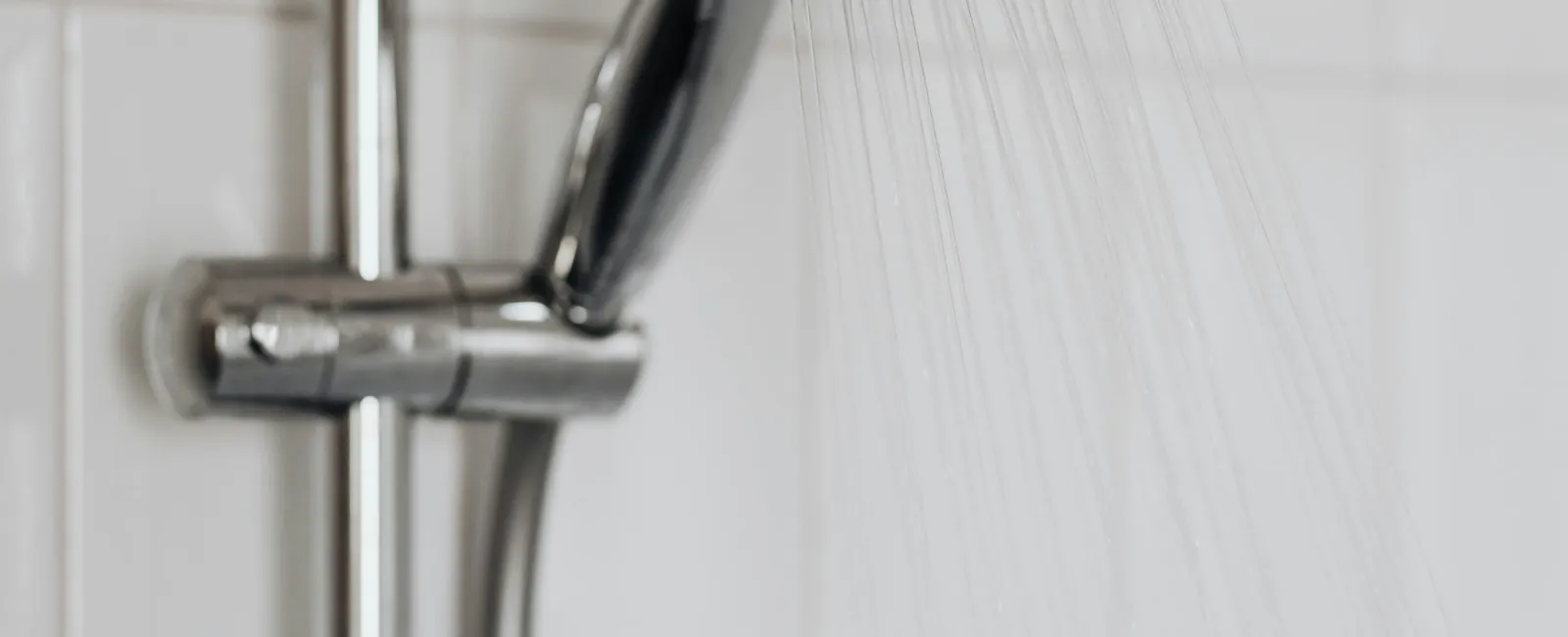 a shower head in a bathroom