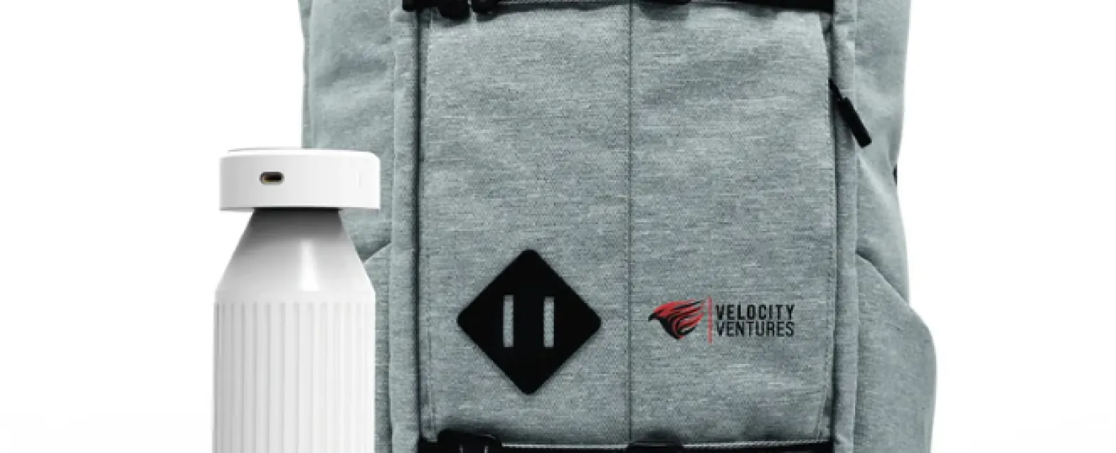 Grey Velocity Ventures backpack with branded water bottle, wireless earbuds, charger, and accessories on white background