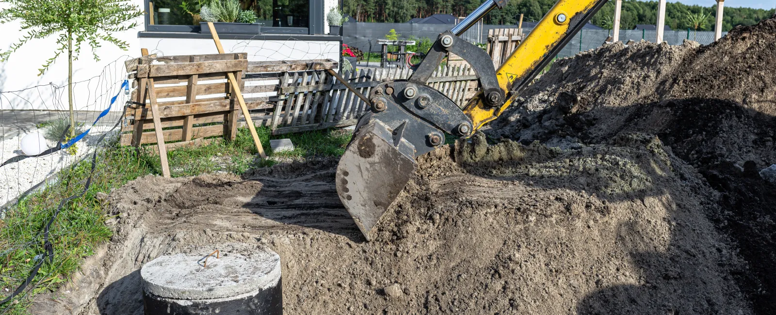 a construction site with a yellow machine