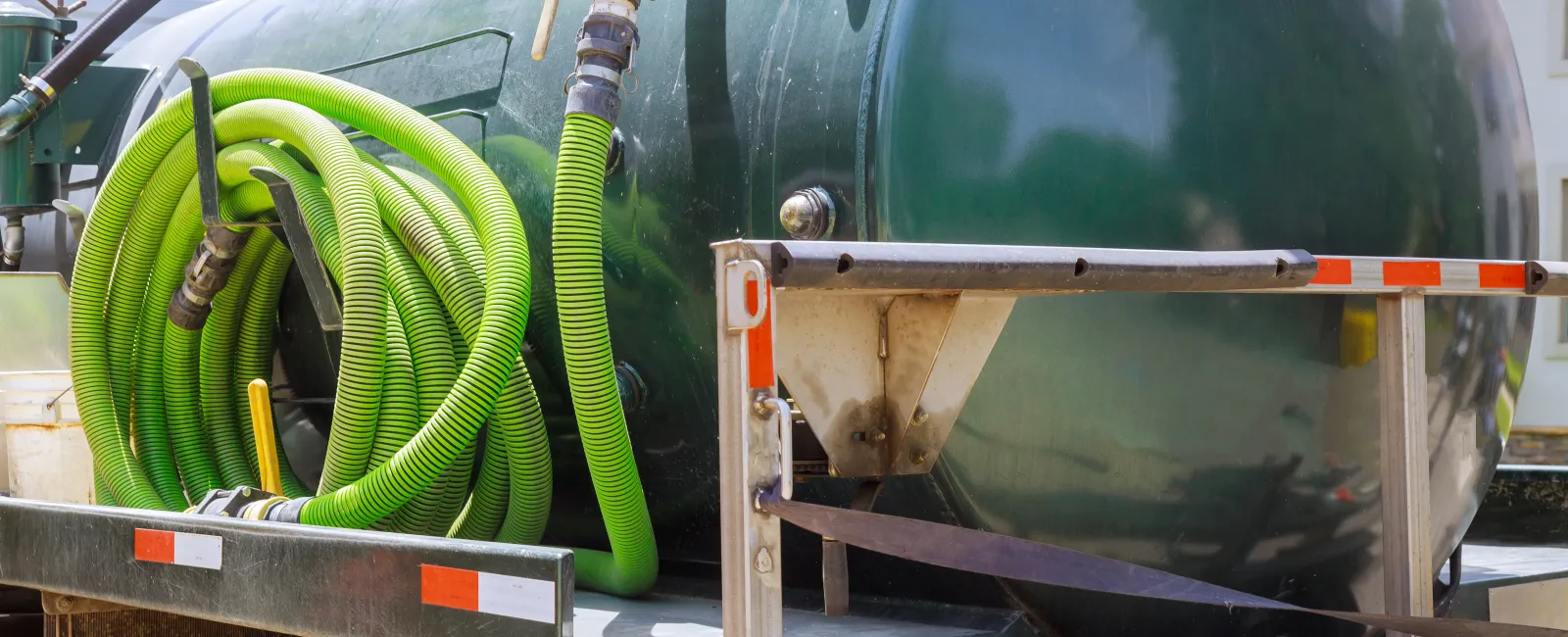 a green machine on a trailer