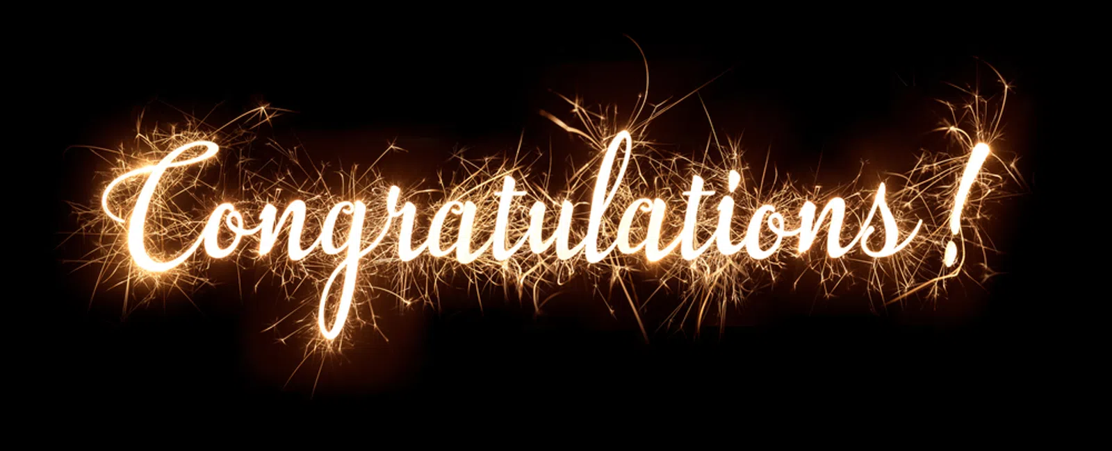 Word Congratulations written with bright sparkling lights on a black background