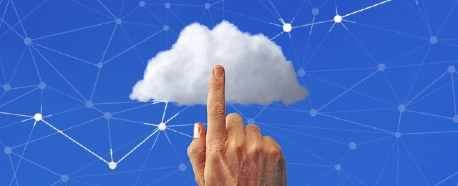 Hand pointing at a cloud icon with a blue network background, symbolizing cloud computing and data connectivity.