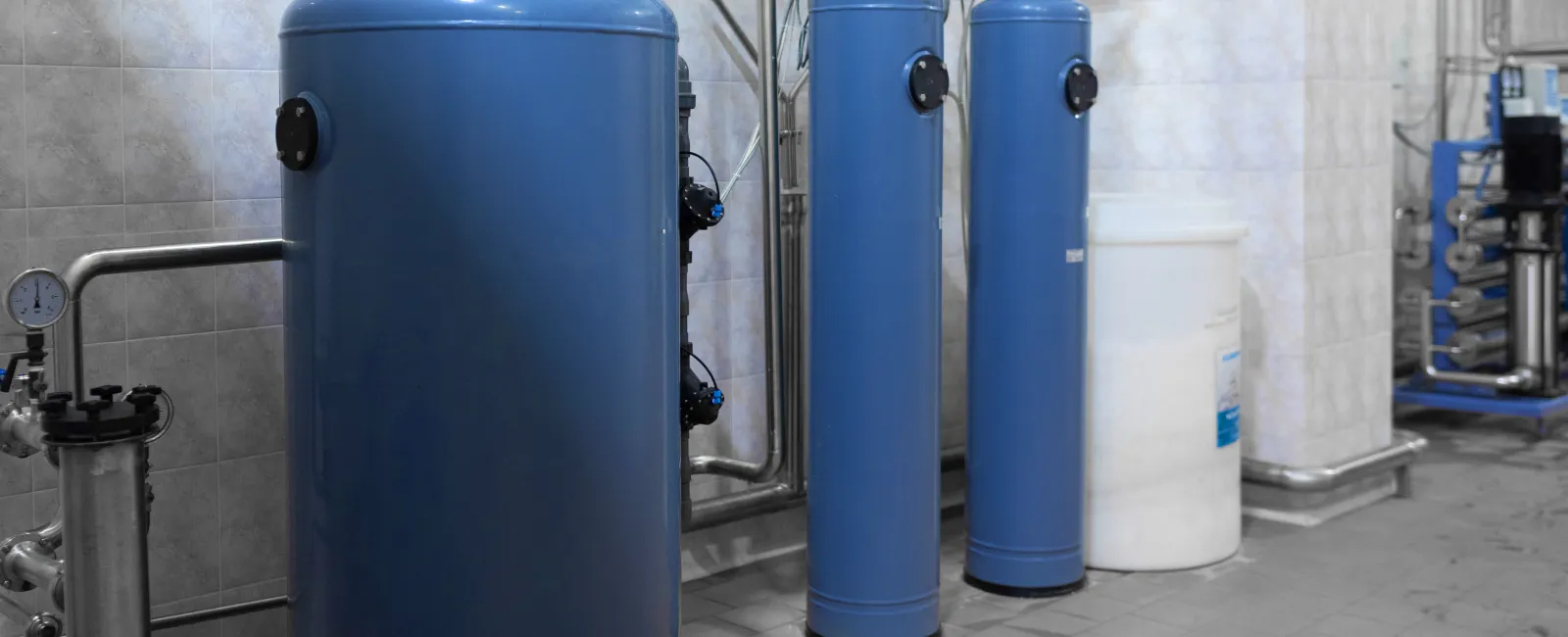 a group of blue cylindrical cylinders
