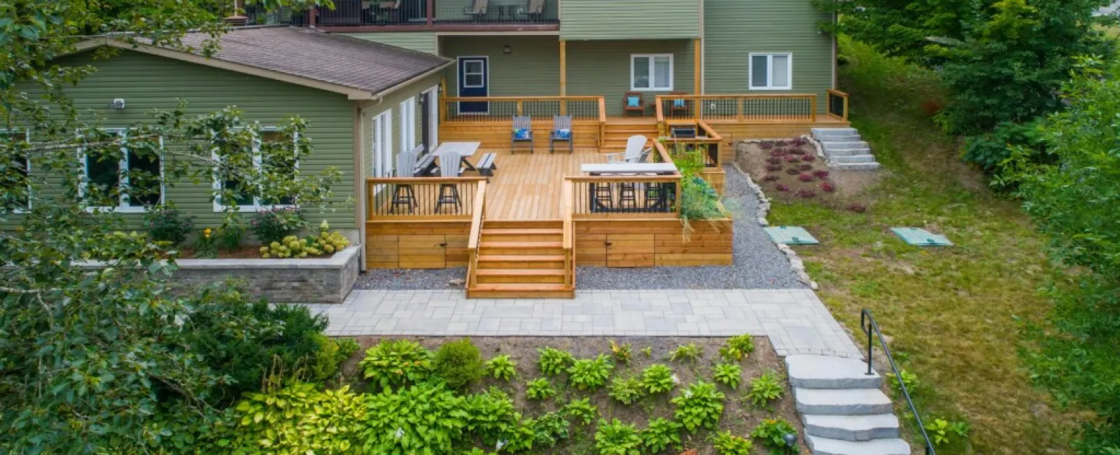 a house with a deck and trees