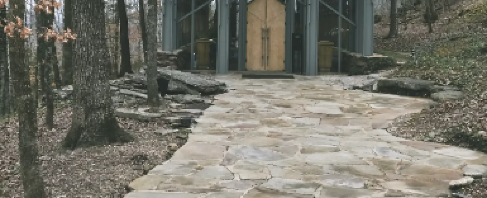 a stone path leading to a building