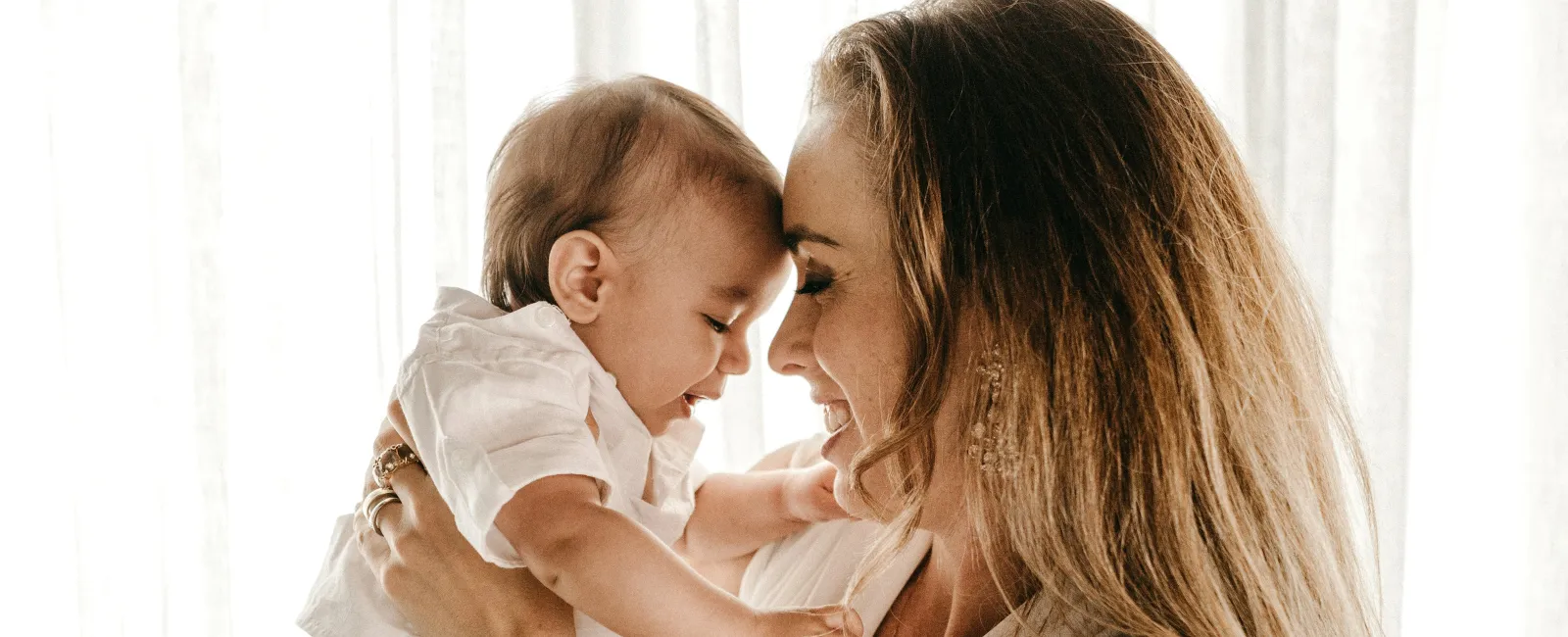 a person holding a baby