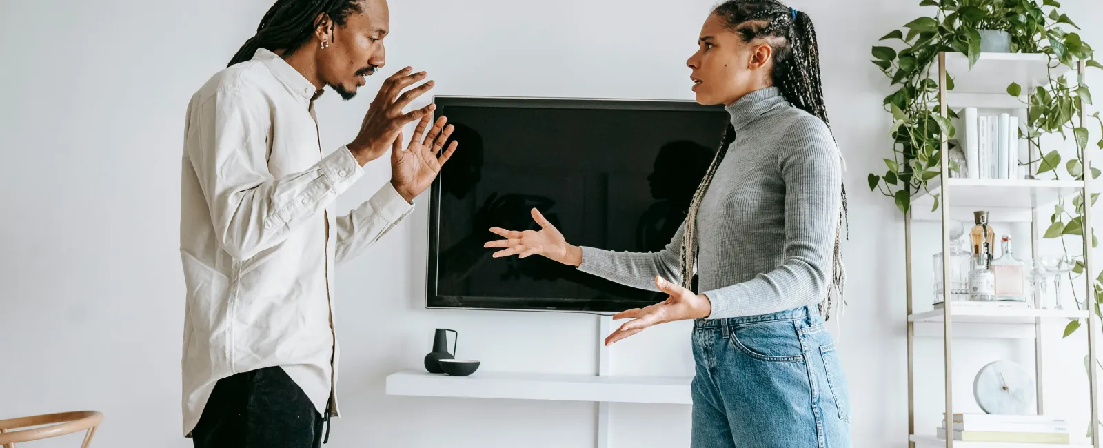 a man and a woman having a passionate conversation