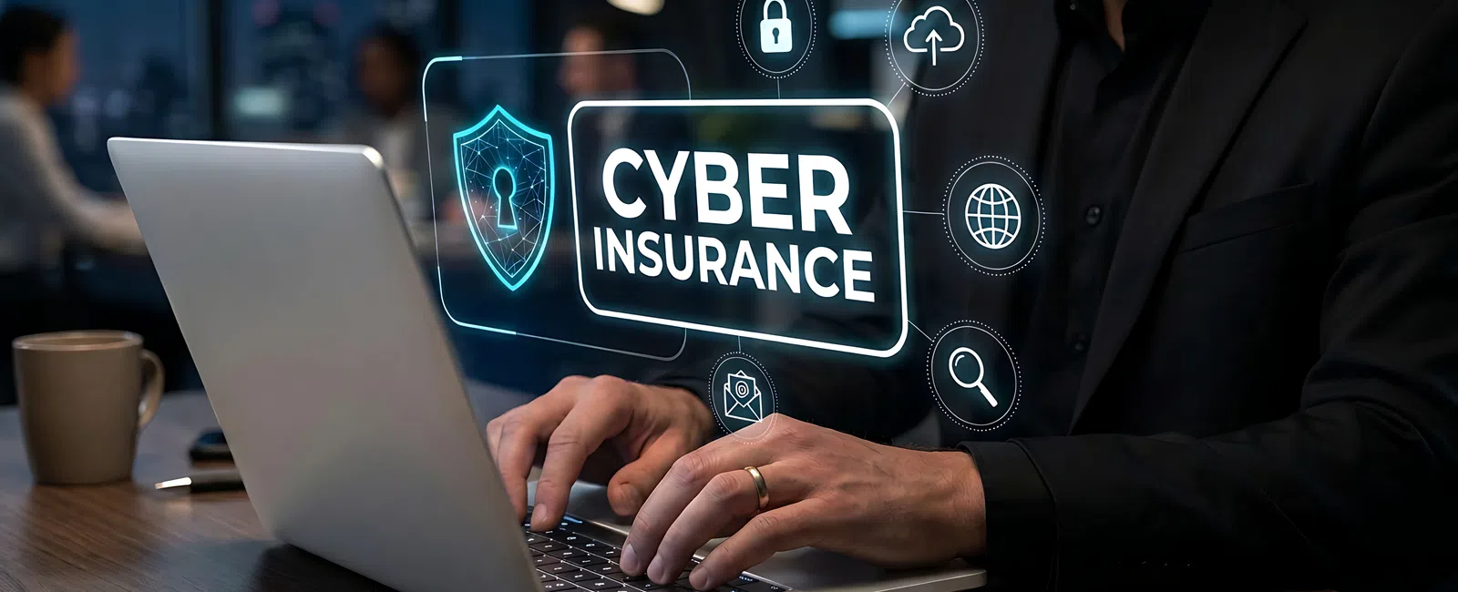 Businessman working on laptop with digital cyber insurance icons and security symbols floating above keyboard.
