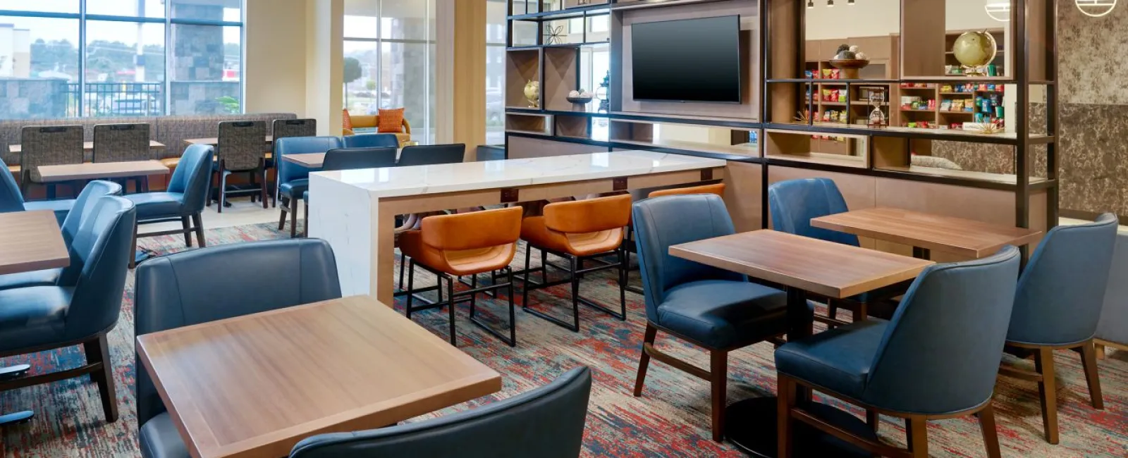 TownePlace and Springhill Suites Dual Brand by Marriott Custom Public Area Communal Table and Wood Slat Ceiling