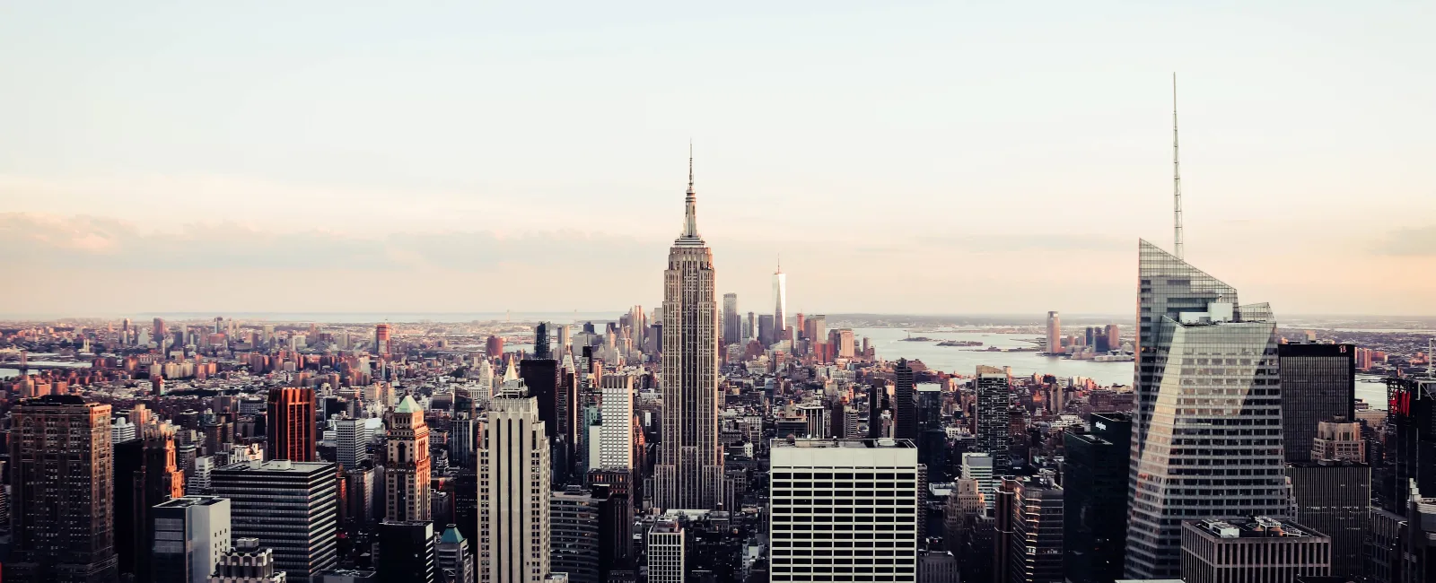 a large city landscape with 30 Rockefeller Plaza in the background