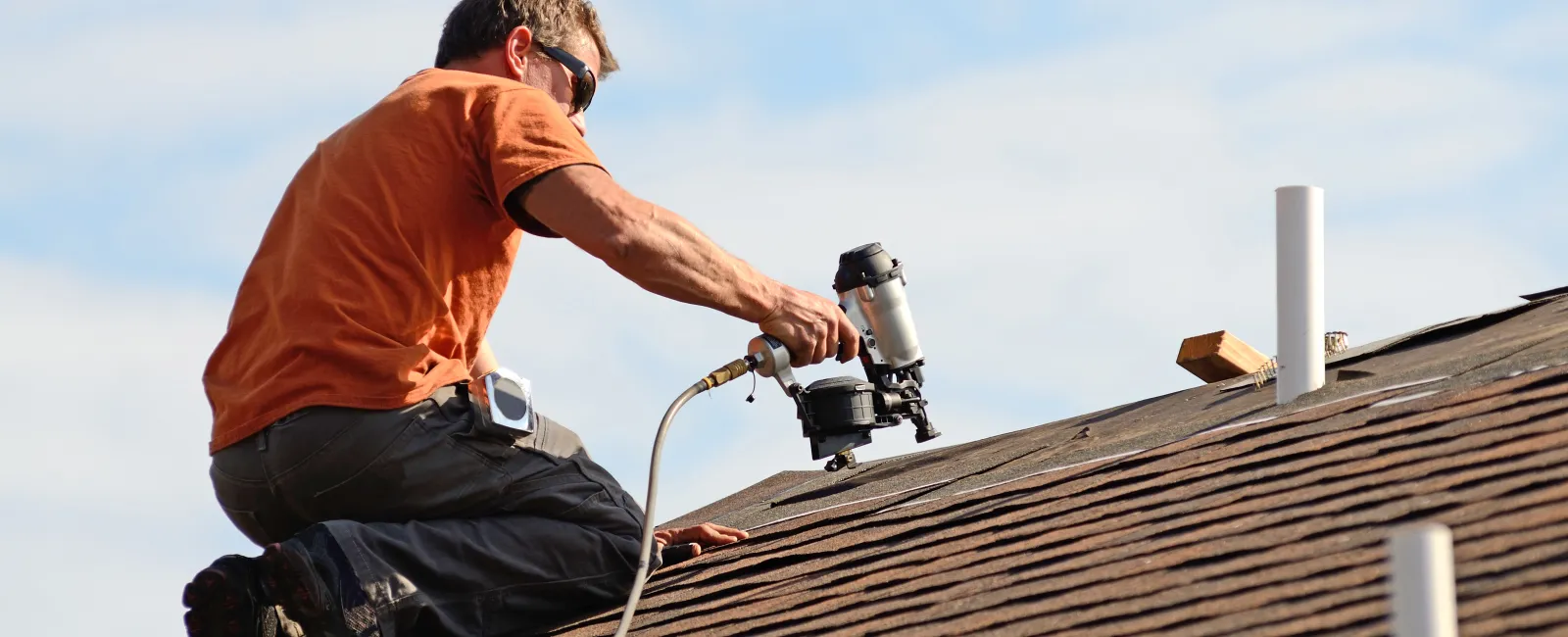 a man on a roof