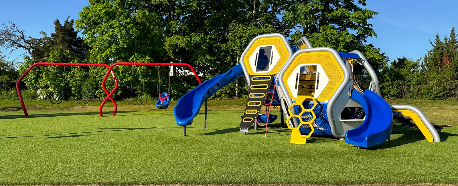 a yellow and blue playground toy