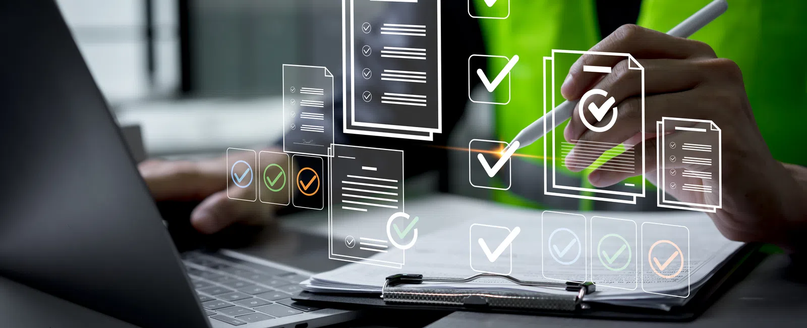 Person using tablet and laptop with floating checklists and documents representing task management and productivity.