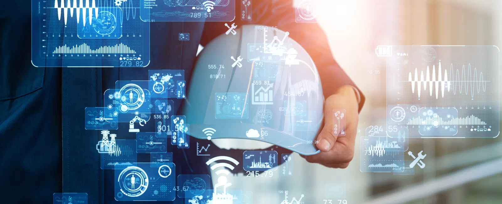 Engineer holding white safety helmet with digital technology and data charts overlay in modern industrial setting