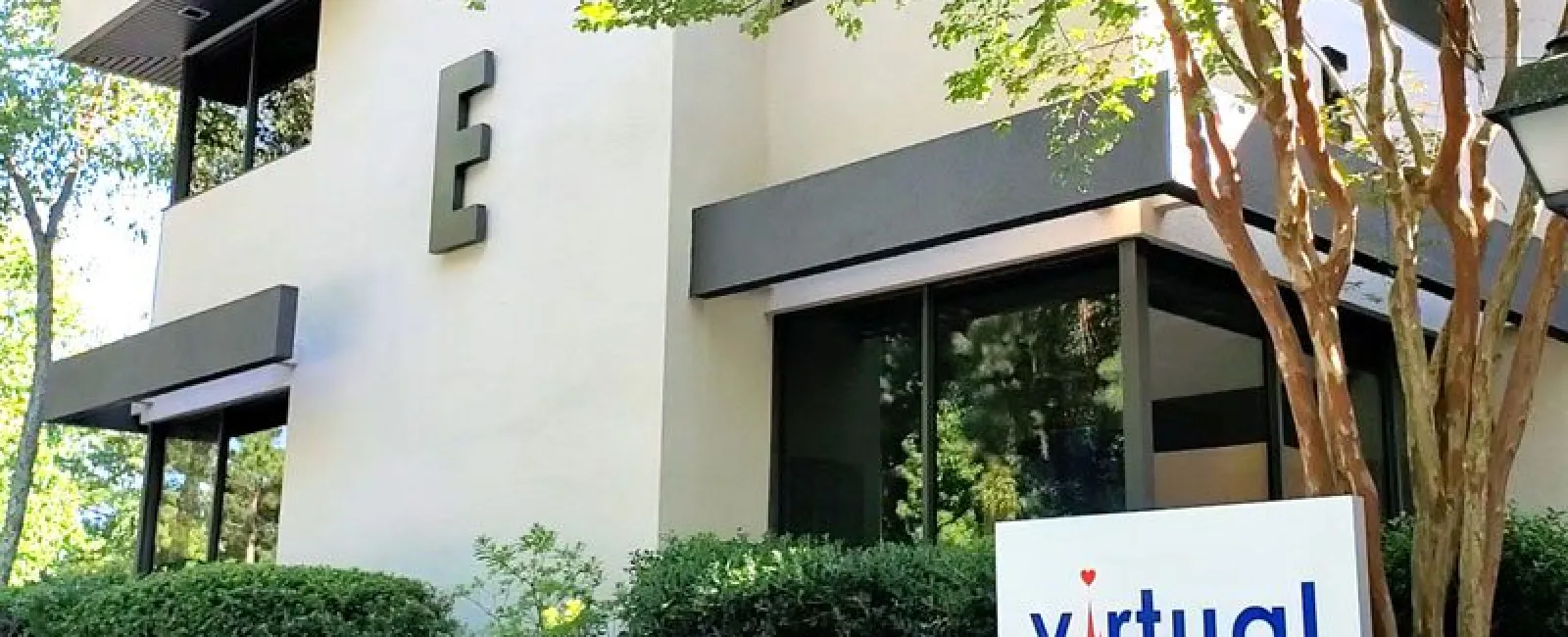 a building with a sign in front