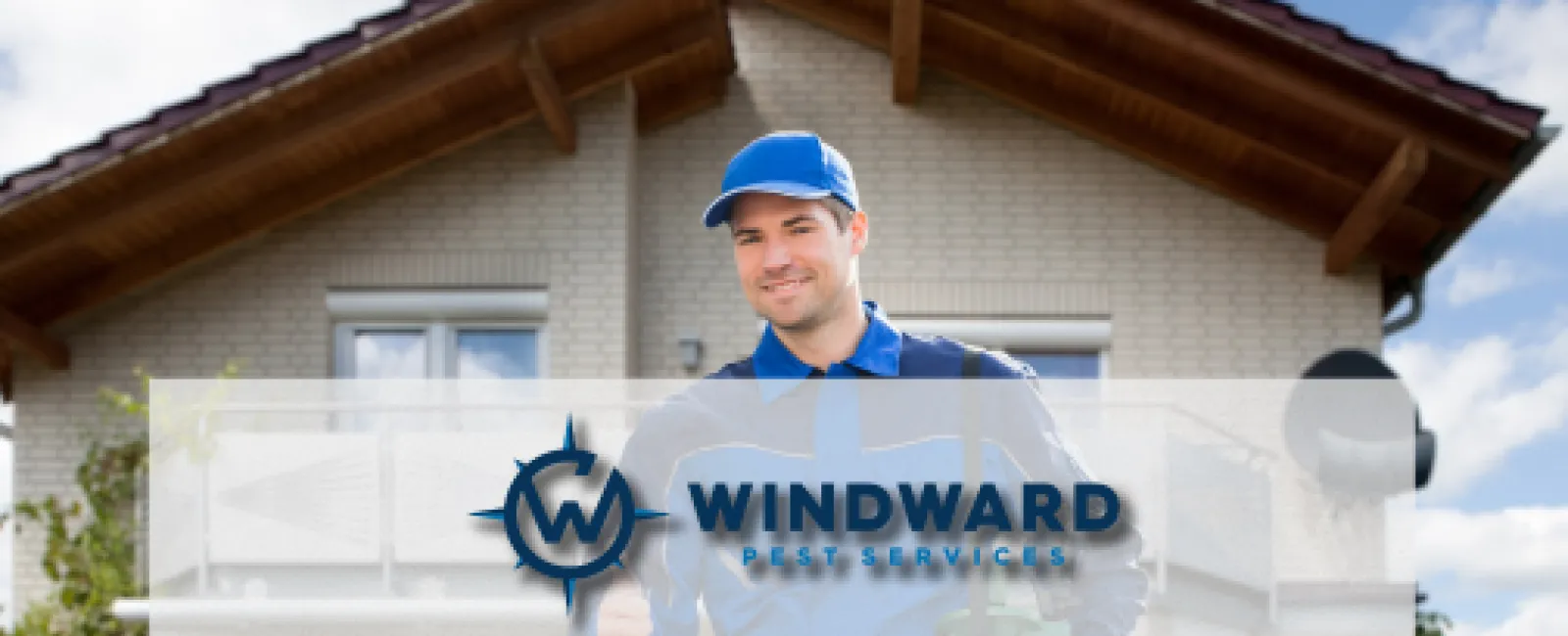 a person wearing a blue hat and standing in front of a house