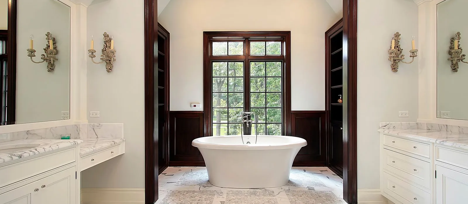 a bathroom with a tub and sink