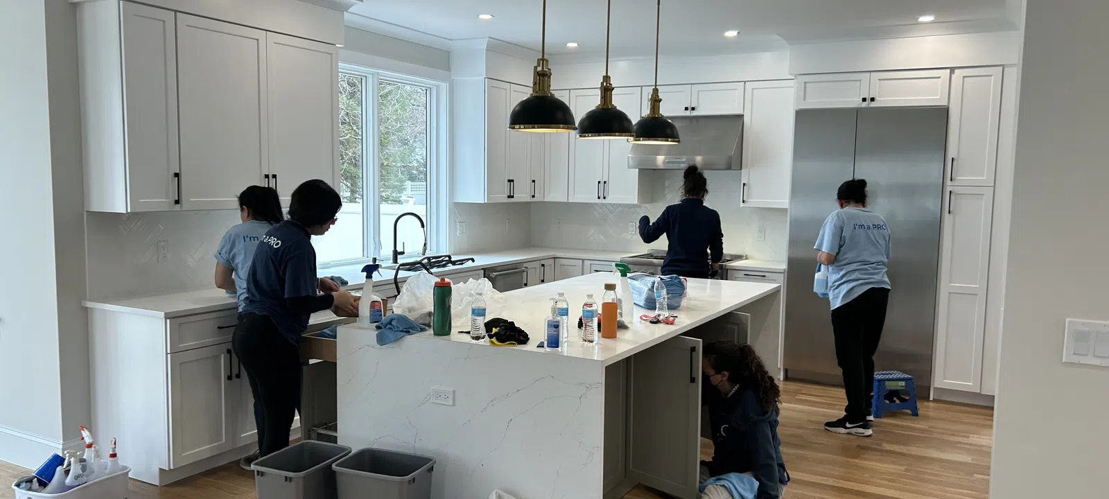 MaidPro Needham house cleaning professionals cleaning a kitchen