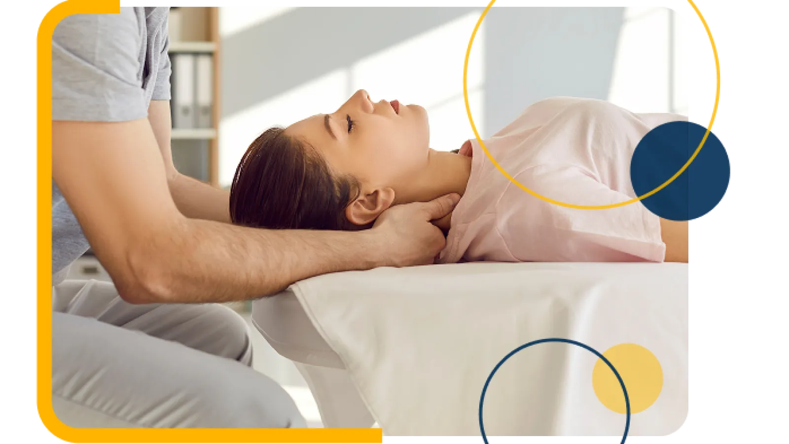Therapist performing neck massage on a relaxed woman lying on a massage table in a bright room.