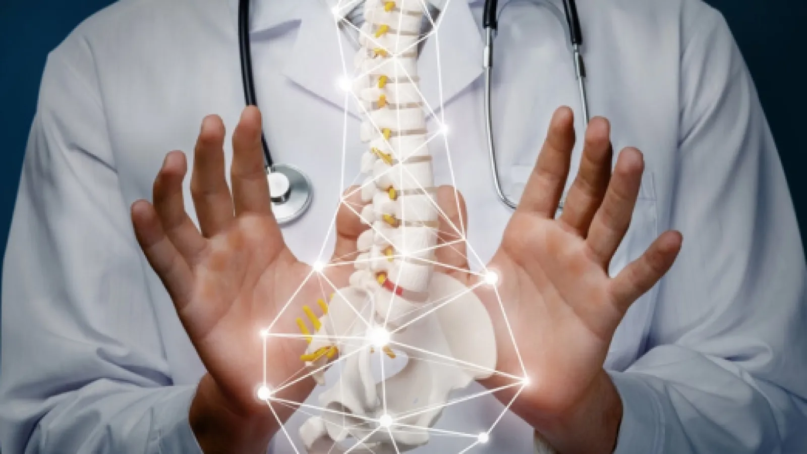 Doctor with stethoscope holding a glowing digital spine model representing spinal health and medical care.