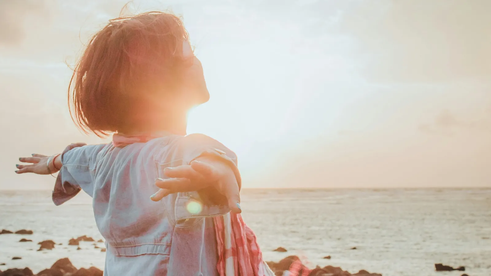 a child standing on a beach