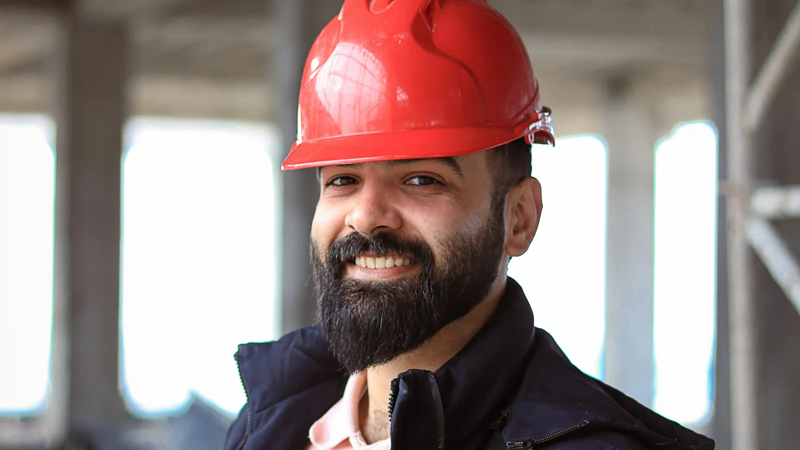 a man wearing a red hat
