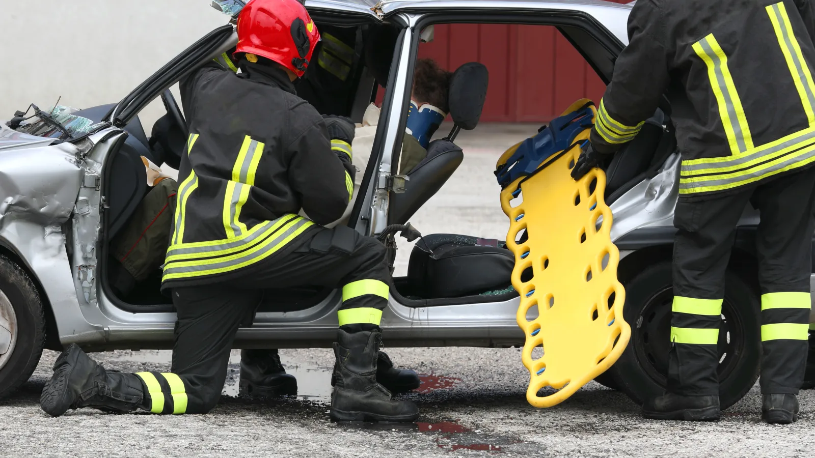 a group of firefighters putting out a fire
