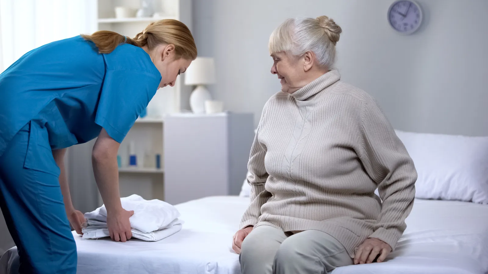 a person checking a patient's belly