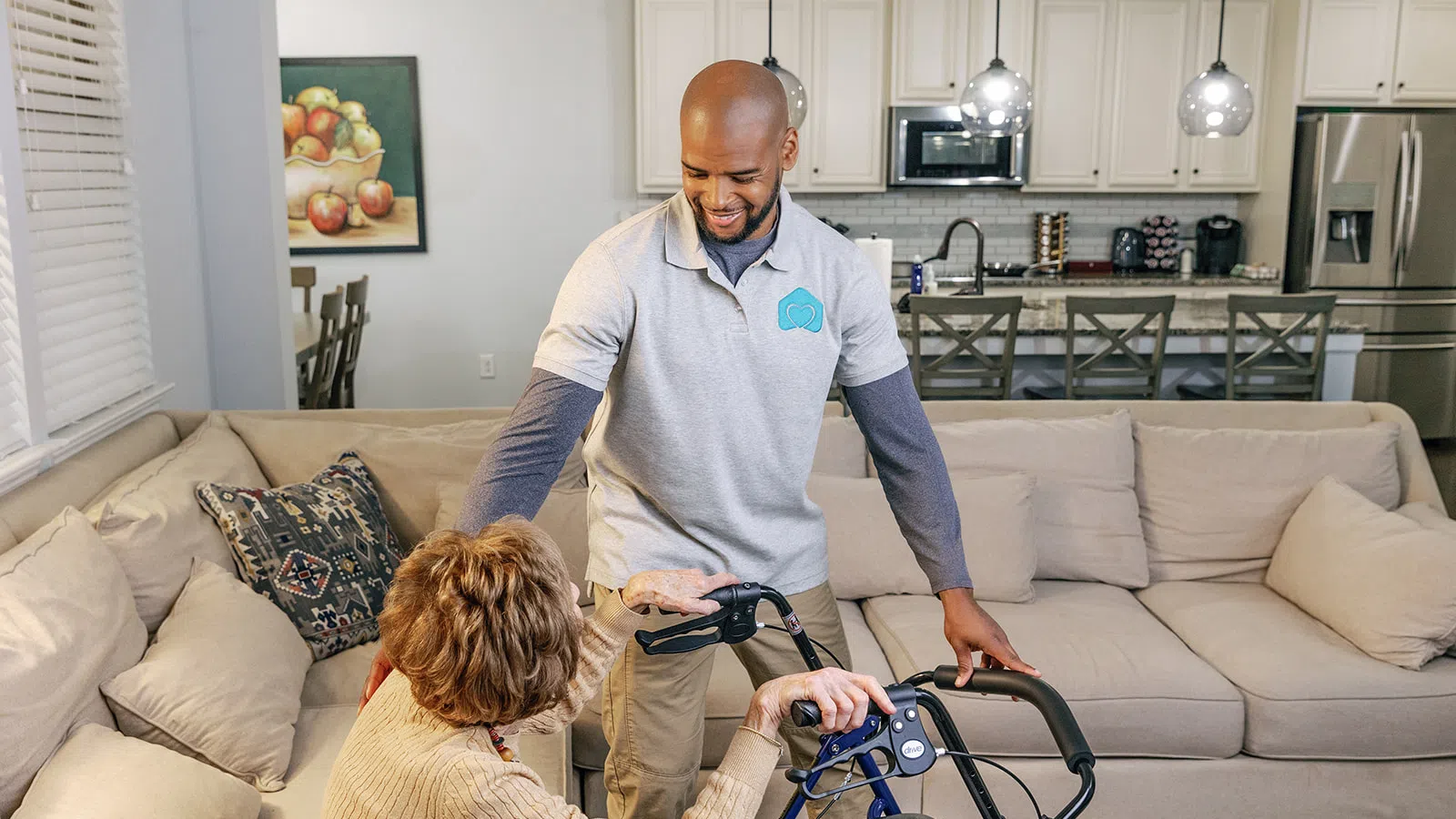 a man and a woman with a bicycle in a living room