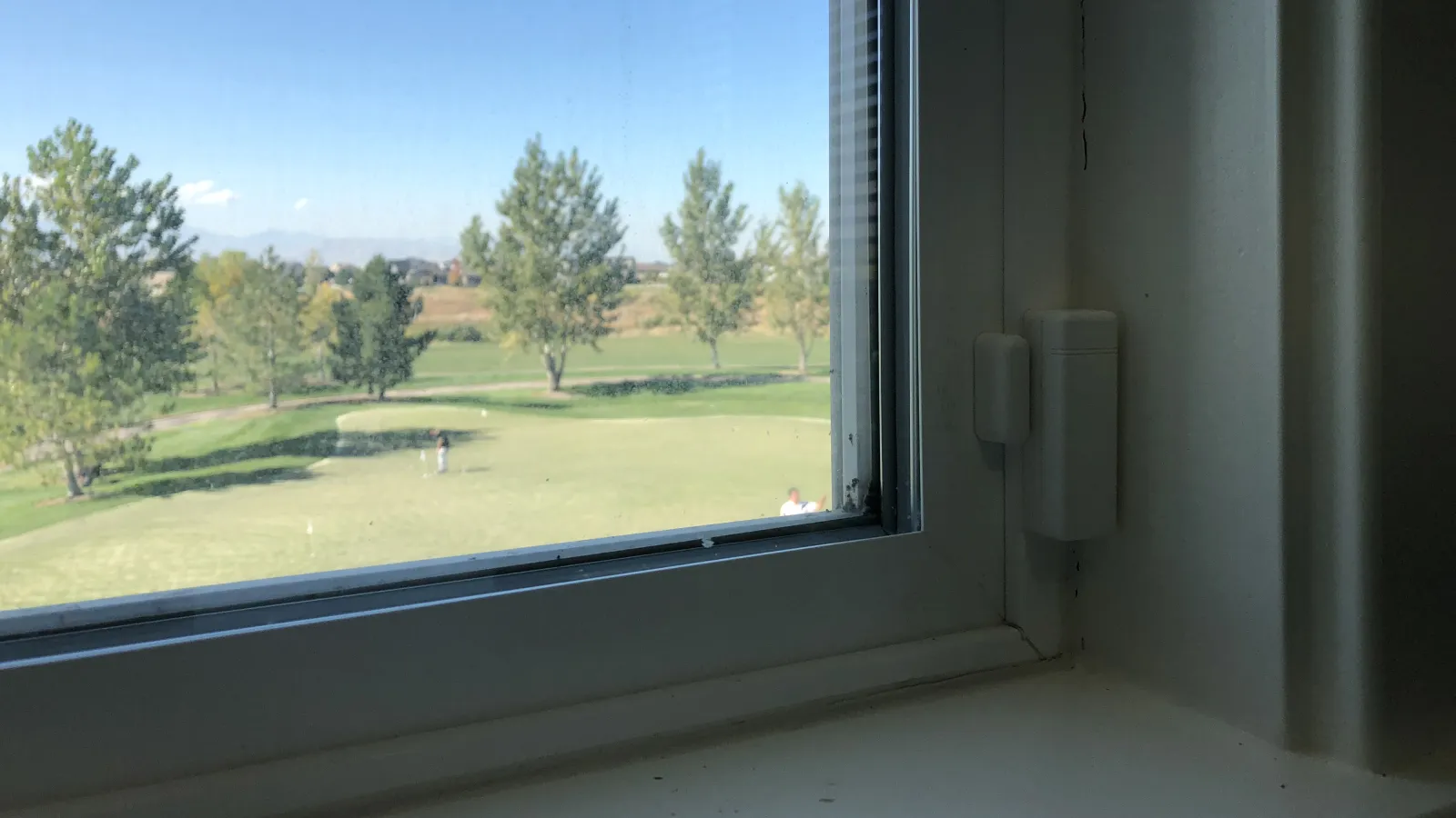 a view of a field through a window