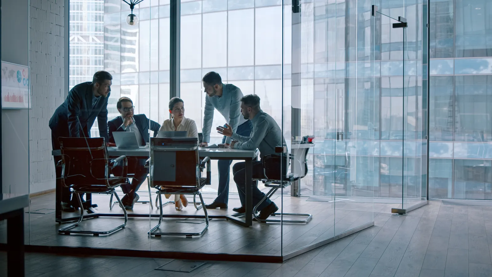 a group of people sitting around a table