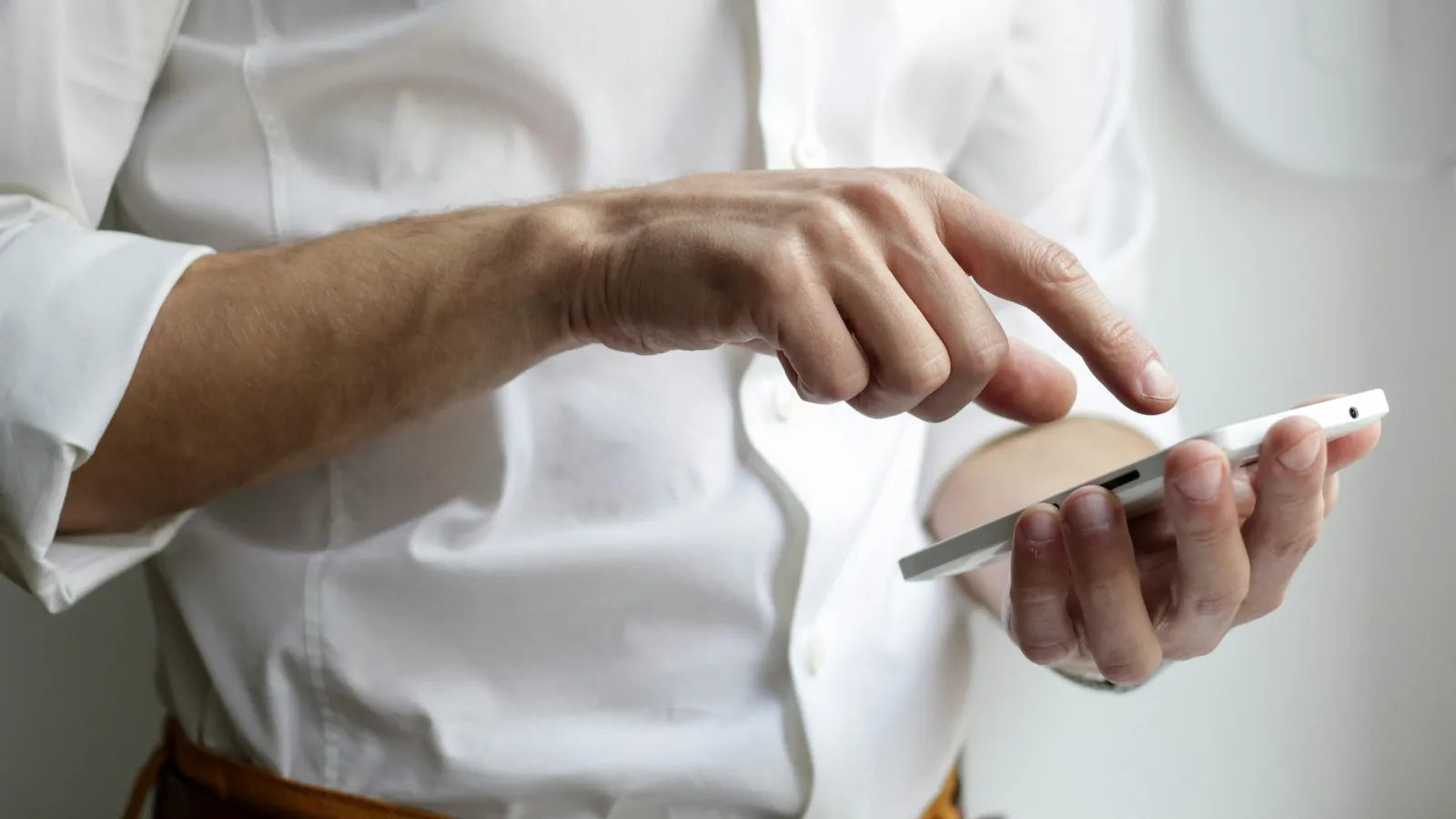 a man holding a tablet