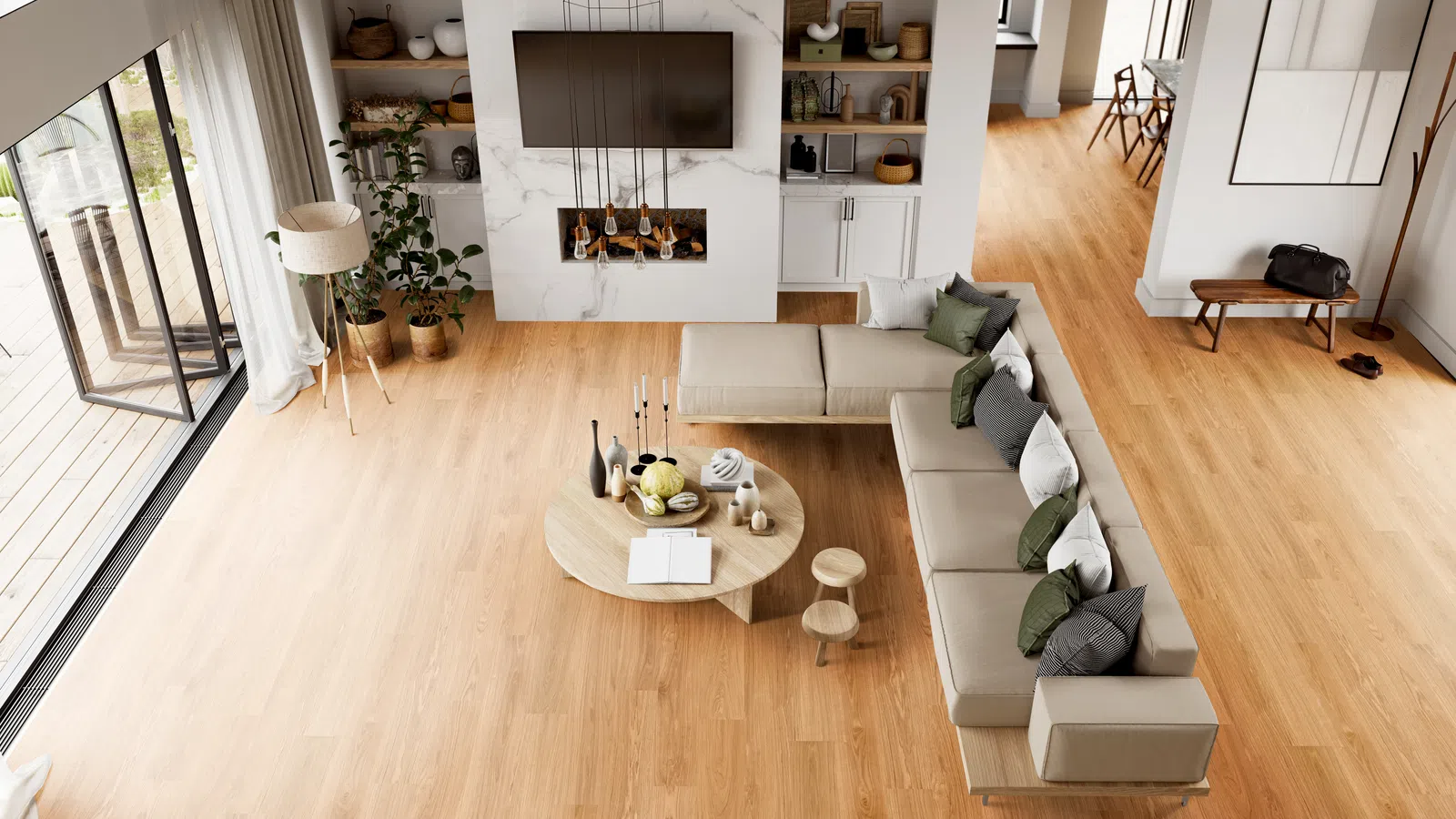 Modern living room with beige sectional sofa, wooden floor, round coffee table, and floor-to-ceiling windows.