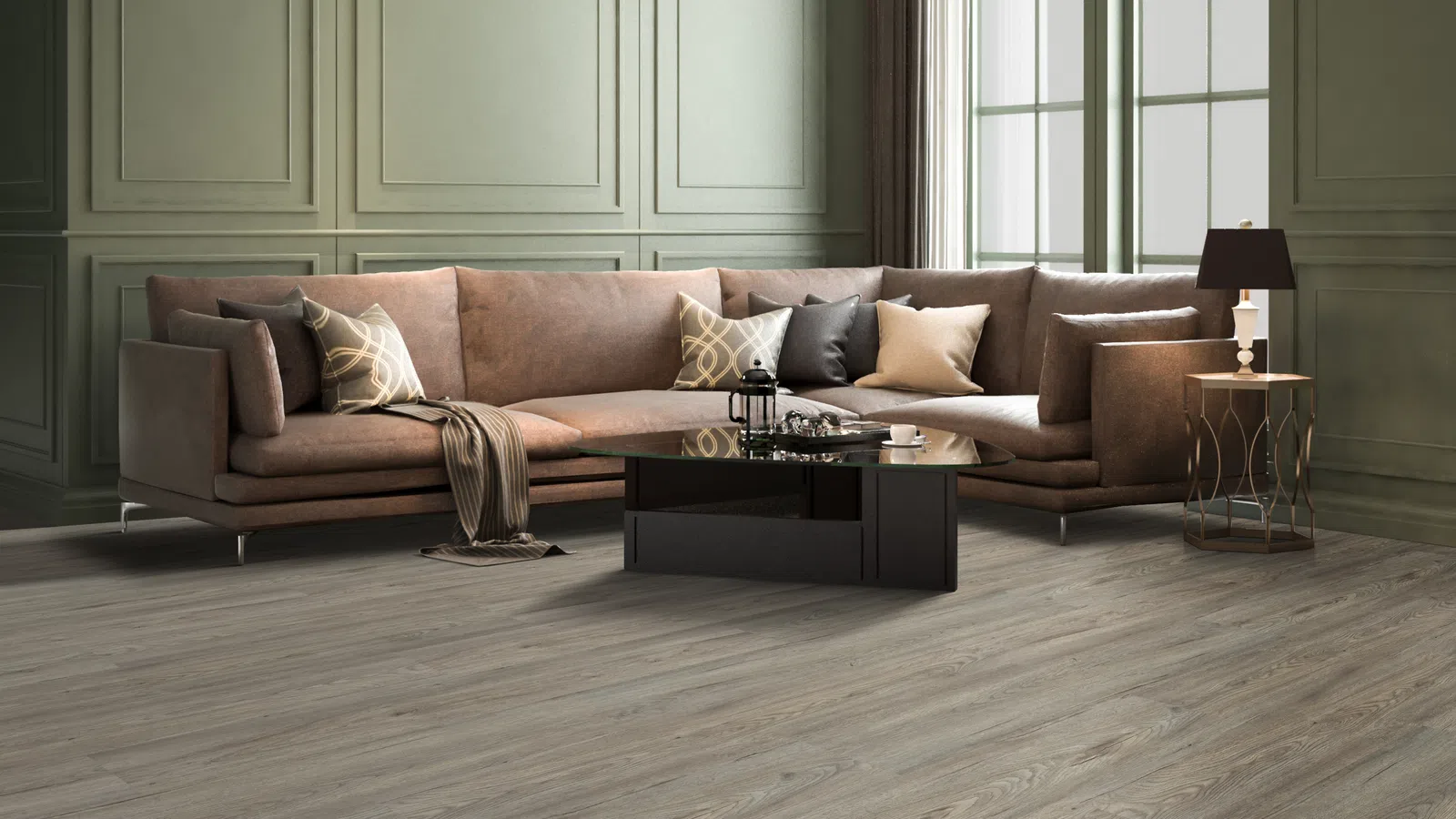 Modern living room with brown L-shaped sofa, decorative pillows, glass coffee table, and large windows.