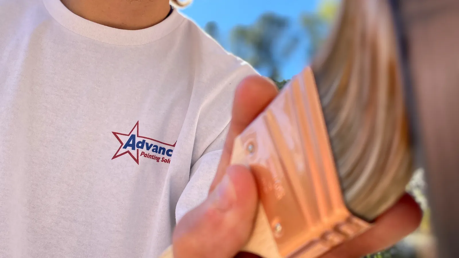 a person holding a bag of ice cream