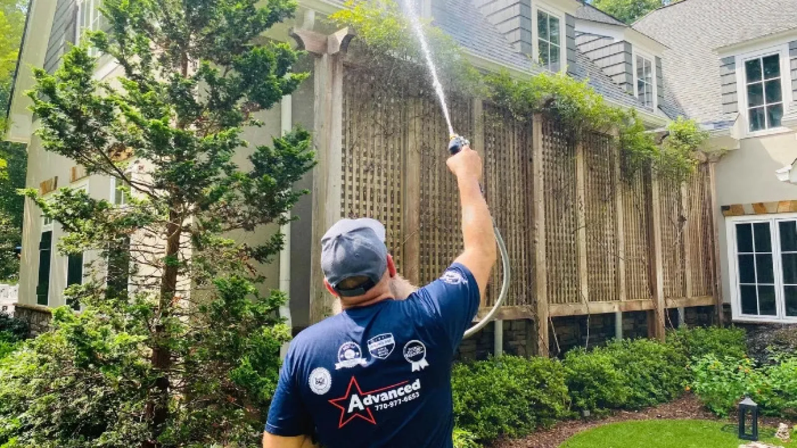 a man holding a hose