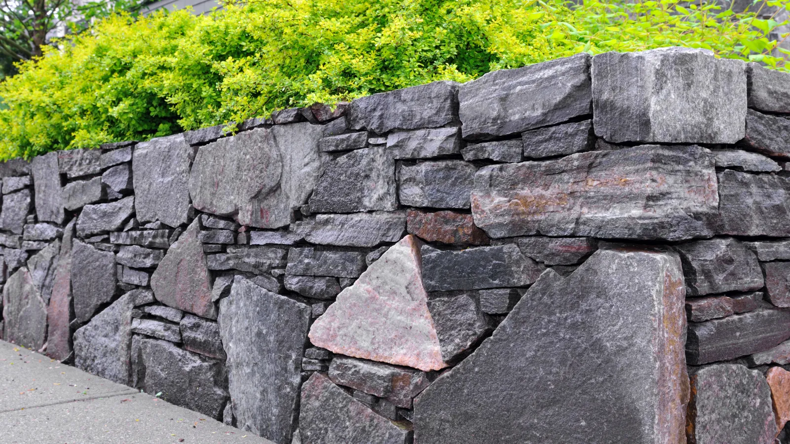 a stone wall with a stone wall