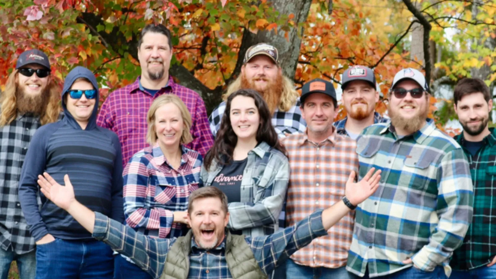 a group of people posing for a photo