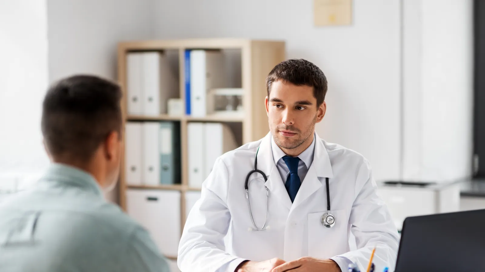 a doctor talking to a patient