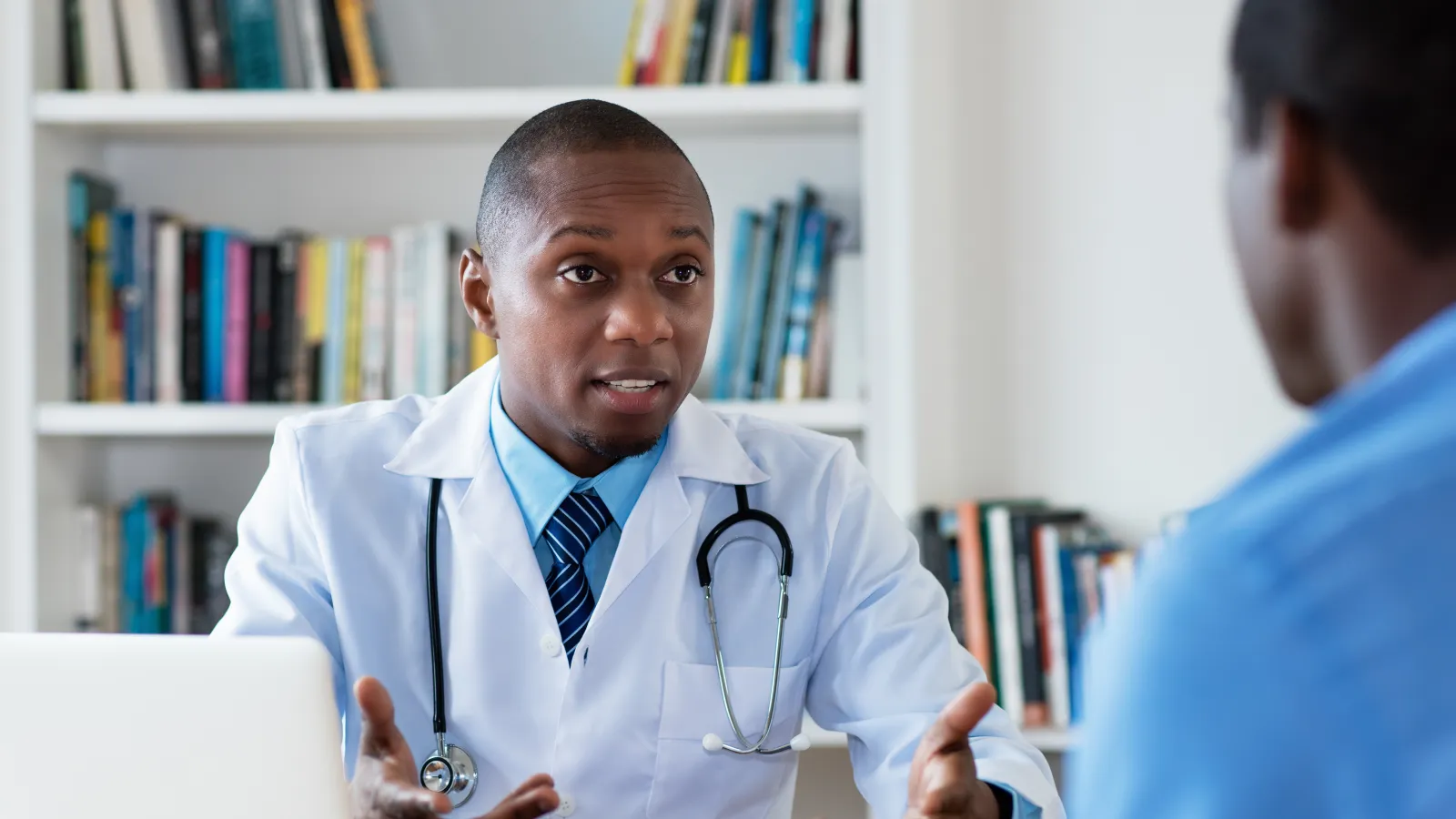 a doctor talking to a patient